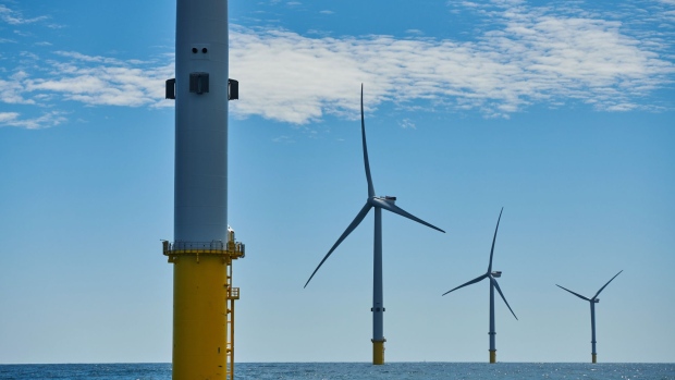 Wind turbines stand on the EDF Blyth Offshore Demonstrator (BOD) wind farm, operated by EDF Energy Renewables Ltd., off the Northumberland coast in Blyth, U.K., on Friday, June 22, 2018. Electricite de France SA Chief Executive Officer Jean-Bernard Levy said it’s too risky to invest in large wind power projects without subsidies because swings in electricity prices would endanger returns for developers and their shareholders. 