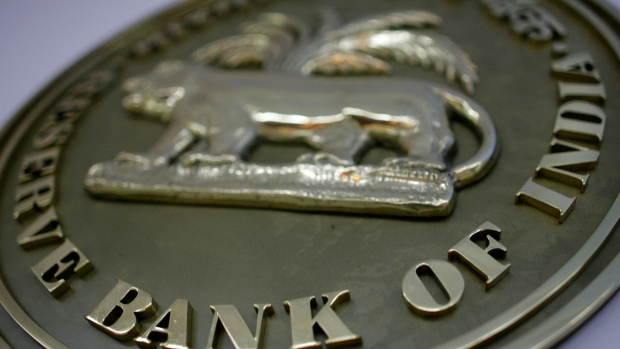INDIA - MARCH 16: The seal for the Reserve Bank of India hangs on a wall in th RBI building, in Mumbai, India, Friday, March 16, 2007. India's central bank will cap rupee gains after a rally to a nine-year high curbed export earnings, said N.S. Paramsivam, head of treasury at Essar Group, which owns oil, steel and shipping businesses. (Photo by Scott Eells/Bloomberg via Getty Images) 