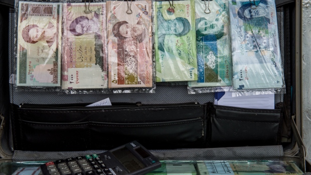 A briefcase filled with Iranian rial banknotes sits on display at a currency exchange in Tehran, Iran, on Saturday, Nov. 3, 2018. Iran’s Supreme Leader Ayatollah Khamenei said U.S. President Donald Trump’s policies are opposed by most governments and fresh sanctions on the Islamic Republic only serve to make it more productive and self-sufficient, the semi-official Iranian Students’ News Agency reported. 