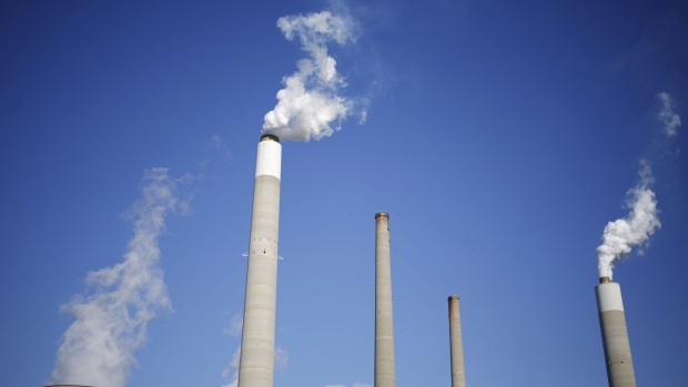 Emissions rise from the American Electric Power Co. (AEP) coal-fired John E. Amos Power Plant in Winfield, West Virginia, U.S., on Wednesday, July 18, 2018. American Electric Power Co., Duke Energy Corp., and others say they can't recoup money they spent to meet requirements to cut mercury and other air toxics from their facilities and therefore want the Environmental Protection Agency (EPA) to retain the Mercury and Air Toxics Standards (MATS) rule as is. 