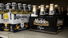 Six-packs of Constellation Brands Inc. Corona and Modelo Negra brand beer sit on a shelf at a store in Ottawa, Illinois, U.S., on Tuesday, April 2, 2019. Constellation Brands is scheduled to release earnings figures on April 4. 