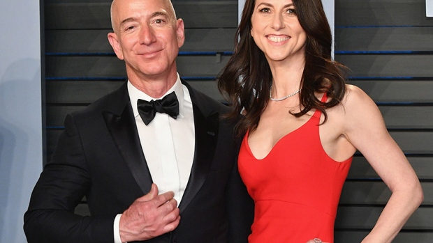 Jeff Bezos (L) and MacKenzie Bezos attend the 2018 Vanity Fair Oscar Party hosted by Radhika Jones at Wallis Annenberg Center for the Performing Arts on March 4, 2018 in Beverly Hills, California.