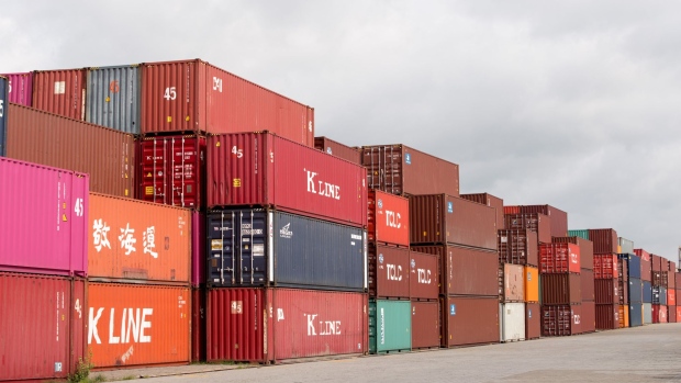 Containers sit stacked at Tan Cang-Hiep Phuoc Port, operated by Saigon Newport Corp., in Ho Chi Minh City, Vietnam, on Thursday, June 27, 2019. Vietnam has benefited from a surge in exports and foreign investment as businesses look to scale back their China operations or relocate to avoid higher U.S. tariffs. 