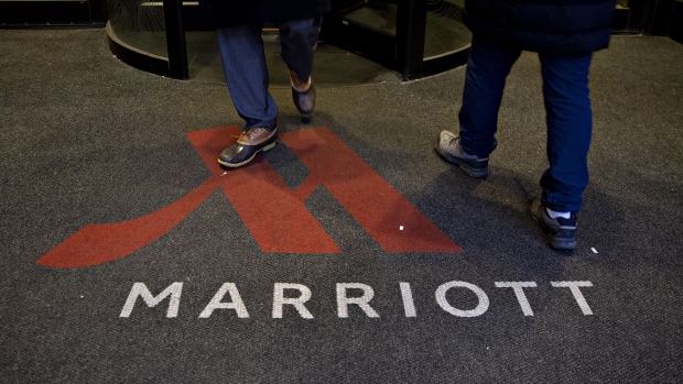 A logo is displayed on a rug outside a Marriott International Inc. hotel in Chicago, Illinois, U.S., on Friday, Nov. 30, 2018. A cyber breach in Starwood's reservation system had allowed unauthorized access to information about as many as 500 million guests since 2014. 
