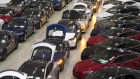 A line of new Tesla Model X sports utility vehicles (SUV), center, sit with Tesla Model S automobiles following assembly for the European market at the Tesla Motors Inc. factory in Tilburg, Netherlands, on Friday, Dec. 9, 2016. A boom in electric vehicles made by the likes of Tesla could erode as much as 10 percent of global gasoline demand by 2035, according to the oil industry consultant Wood Mackenzie Ltd. 