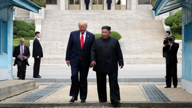 PANMUNJOM, SOUTH KOREA - JUNE 30: (SOUTH KOREA OUT): A handout photo provided by Dong-A Ilbo of North Korean leader Kim Jong Un and U.S. President Donald Trump inside the demilitarized zone (DMZ) separating the South and North Korea on June 30, 2019 in Panmunjom, South Korea. U.S. President Donald Trump and North Korean leader Kim Jong-un briefly met at the Korean demilitarized zone (DMZ) on Sunday, with an intention to revitalize stalled nuclear talks and demonstrate the friendship between both countries. The encounter was the third time Trump and Kim have gotten together in person as both leaders have said they are committed to the "complete denuclearization" of the Korean peninsula. (Photo by Handout/Dong-A Ilbo via Getty Images)