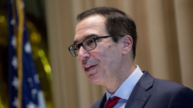 Steven Mnuchin, U.S. Treasury secretary, speaks during an Internal Revenue Service (IRS) Criminal Investigation 100th year anniversary event at the IRS headquarters in Washington, D.C., U.S., on Monday, July 1, 2019. On July 1, 1919, the IRS commissioner crated the Intelligence Unit to investigate widespread allegations of tax fraud. Photographer: Andrew Harrer/Bloomberg       