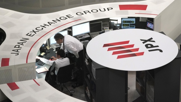 Employees work at the Tokyo Stock Exchange (TSE), operated by Japan Exchange Group Inc. (JPX), in Tokyo, Japan, on Tuesday, May 7, 2019. Trading resumed Tuesday after a 10-day Golden Week holiday with a slew of news for investors to process. 