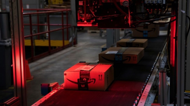 A package pass a scanner while moving along a conveyor at the Amazon.com Inc. fulfillment center in Robbinsville, New Jersey, U.S. Photographer: Bloomberg/Bloomberg
