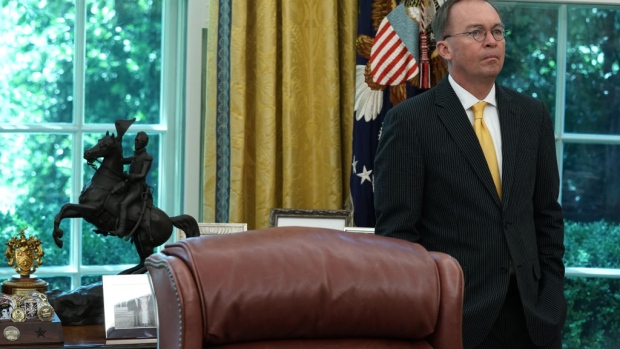 WASHINGTON, DC - JULY 09: Acting White House Chief of Staff Mick Mulvaney listens during a meeting between U.S. President Donald Trump and Qatari Emir Sheikh Tamim bin Hamad Al Thani in the Oval Office at the White House July 9, 2019 in Washington, DC. The two leaders held a bilateral meeting to discuss regional issues. (Photo by Alex Wong/Getty Images)