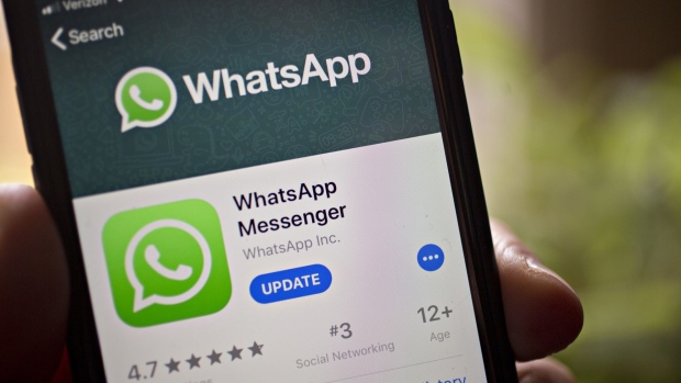 The Facebook Inc. WhatsApp application is displayed in the App Store on an Apple Inc. iPhone in an arranged photograph taken in Arlington, Virginia, U.S. on Monday, April 29, 2019. Facebook paid out a $123 million fine to EU antitrust regulators for failing to provide accurate information during their review of Facebook's WhatsApp takeover. 