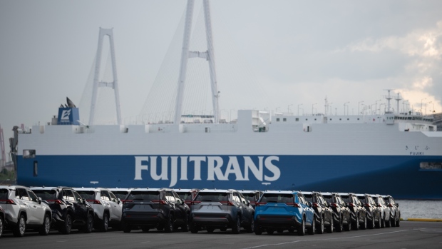 Toyota Motor Corp. Rush vehicles bound for shipment sit at the Nagoya Port in Tokai, Aichi Prefecture, Japan, on Wednesday, June 12, 2019. Toyota brought forward an electrified-vehicle sales target by five years as demand picks up. The company expects to have annual sales of 5.5 million of such vehicles globally in 2025, compared with a previous target of 2030. 