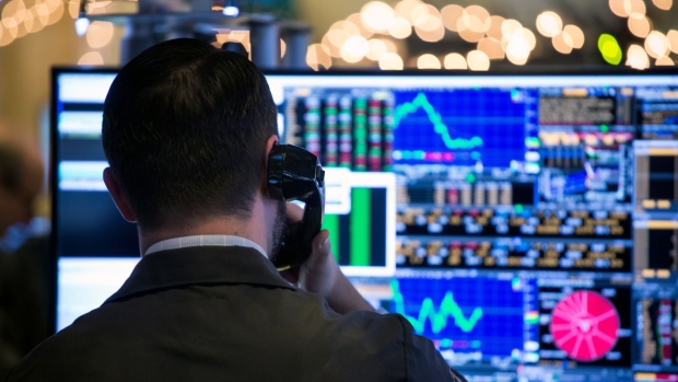 A trader works on the floor of the New York Stock Exchange (NYSE) in New York, U.S., on Wednesday, Jan. 2, 2019. U.S. stocks pared declines after a brutal start, with financial shares rebounding from a dismal December and crude staging a rally. Treasuries trimmed gains. 
