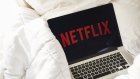 Netflix signage on a laptop computer. Photographer: Gabby Jones/Bloomberg