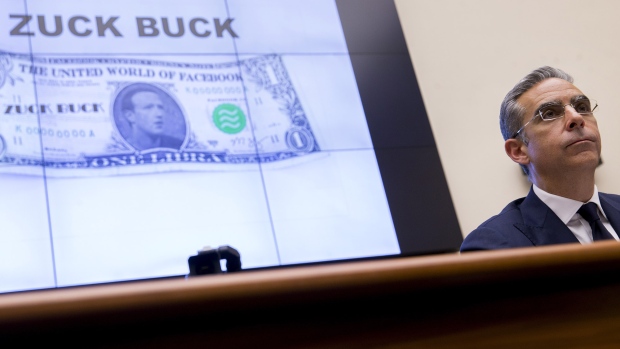 A Zuck Buck is displayed on a monitor as David Marcus, head of blockchain with Facebook Inc., right, is questioned by Representative Brad Sherman, a Democrat from California, not pictured, during a House Financial Services Committee hearing in Washington, D.C., U.S., on Wednesday, July 17, 2019. 