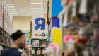 A customer views discounted merchandise displayed for sale at a Toys 'R' Us retail store at Times Square in New York. 