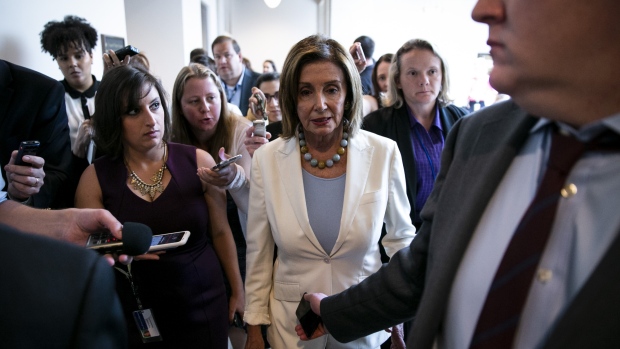 U.S. House Speaker Nancy Pelosi, a Democrat from California, speaks with members of the media following a news conference on Capitol Hill in Washington, D.C., U.S. on Wednesday, July 17, 2019. Pelosi said she still wants a deal this week on the U.S. debt limit to give the House time to pass the measure before Congress's August recess. 