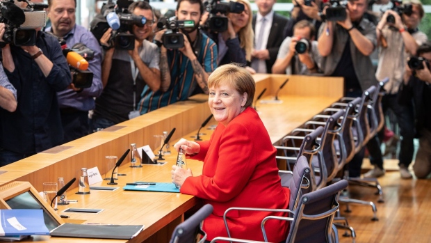 BERLIN, GERMANY - JULY 19: German Chancellor Angela Merkel arrives to speak to the media at her annual press conference on July 19, 2019 in Berlin, Germany. Merkel is in her fourth term as chancellor and will not seek another term after her current term ends in 2021. (Photo by Omer Messinger/Getty Images)