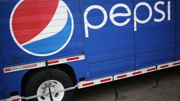 Signage is seen on the side of a delivery truck outside the Pepsi Beverages Co. plant in Louisville, Kentucky, U.S., on Sunday, Feb. 11, 2018. PepsiCo Inc. is scheduled to release earnings figures on February 13. 
