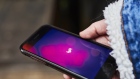 The Lyft Inc. application is displayed on an Apple Inc. iPhone in this arranged photograph taken in New York, New York, U.S., on Sunday, Feb. 24, 2019. Valued at $15.1 billion on the private markets in its last funding round, Lyft is aiming for an IPO valuation of $20 billion to $25 billion, a person familiar with the matter has said. 
