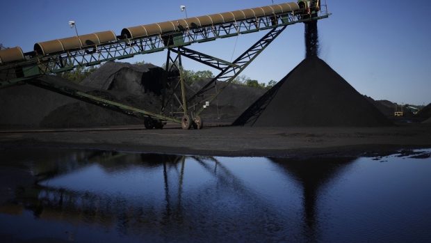 Metallurgical coal is dumped onto a pile at the SunCoke Energy Partners LP Ceredo Terminal in Ceredo, West Virginia, U.S., on Tuesday, May 2, 2017. U.S. coal production rose 17.6% from last year, according to the Department of Energy. 