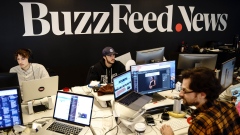 NEW YORK, NY - DECEMBER 11: Members of the BuzzFeed News team work at their desks at BuzzFeed headquarters, December 11, 2018 in New York City. BuzzFeed is an American internet media and news company that was founded in 2006. According to a recent report in The New York Times, the company expects to surpass 300 million dollars in earnings for the 2018 fiscal year. (Photo by Drew Angerer/Getty Images)