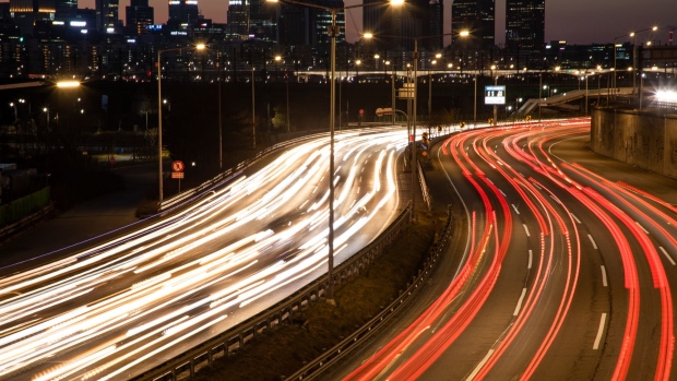 Light trails left by moving traffic run along a highway at dusk in Seoul, South Korea, on Sunday, Jan. 20, 2019. South Korea is scheduled to release fourth-quarter gross domestic product (GDP) figures on Jan. 22. 