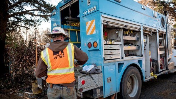 A Pacific Gas & Electric Co. (PG&E) employee works out of a truck in Paradise, California, U.S., on Tuesday, Jan. 22, 2019. 