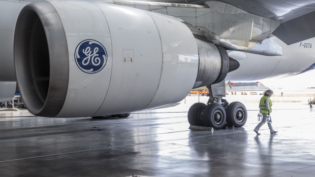 The General Electric Co. (GE) logo sits on a GE Aviation CF6-80C jet engine. 