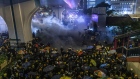 Riot police use tear gas during a protest in Hong Kong on July 21. 