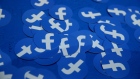 GETTY IMAGES - Paper circles with the Facebook logo are displayed during the F8 Facebook Developers