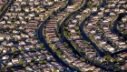 Rows of houses stand in Las Vegas, Nevada, U.S., as seen in this aerial photo taken on Tuesday, Sept. 22, 2009. 
