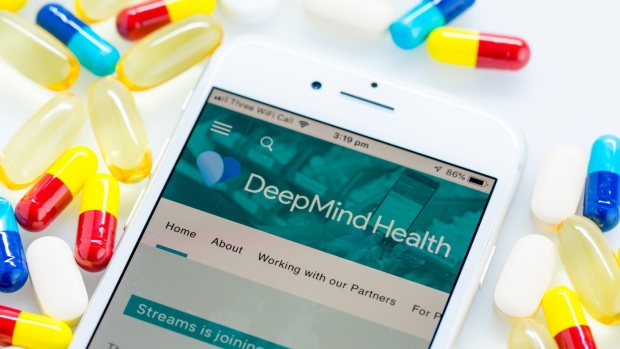 A Deepmind Health webpage sits displayed on the screen of an Apple Inc. iPhone in this arranged photograph in London, U.K. on Monday, Nov. 26, 2018. Three years ago, artificial intelligence company DeepMind Technologies Ltd. embarked on a landmark effort to transform health care in the U.K. Now plans by owner Alphabet Inc. to wrap the partnership into its Google search engine business are tripping alarm bells about privacy. 