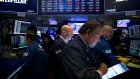 Traders work on the floor of the New York Stock Exchange (NYSE) in New York, U.S., on Monday, Aug. 5