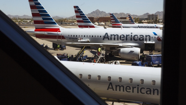 American Airlines Group Inc. planes stand at Phoenix Sky Harbor International Airport in Phoenix. 