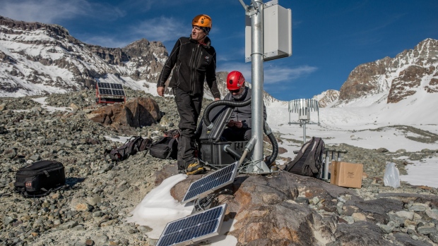 Casassa and Gonzalez inspect a meteorological monitoring station in a valley next to the Andina and Los Bronces mines. Photographer: Tomas Munita/Bloomberg