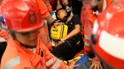 An injured man suspected by protestors of being an undercover police officer at Hong Kong ariport