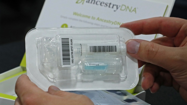 An attendee views an Ancestry.com Inc. DNA kit at the 2017 RootsTech Conference in Salt Lake City, Utah, U.S., on Thursday, Feb. 9, 2017. The four-day conference is a genealogy event focused on discovering and sharing family connections across generations through technology. 