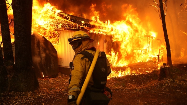 <p>The Camp Fire burns a home in Magalia, California, on Nov. 9, 2018. </p>