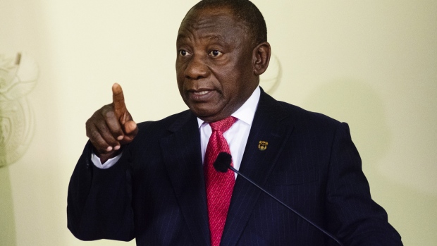 Cyril Ramaphosa, South Africa's president, announces his new cabinet members in Pretoria, South Africa, on Wednesday, May 29, 2019. South Africa's rand extended an advance after Ramaphosa reduced the size of his cabinet and reappointed Tito Mboweni as finance minister and Pravin Gordhan to the public enterprises portfolio. Photographer: Waldo Swiegers/Bloomberg
