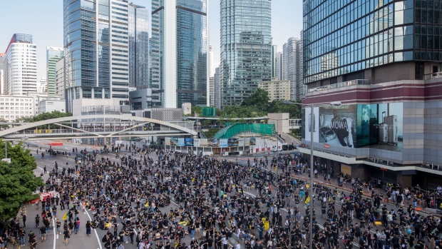 Demonstrators gather during a protest in the Admiralty district of Hong Kong. Photographer: Paul Yeung/Bloomberg