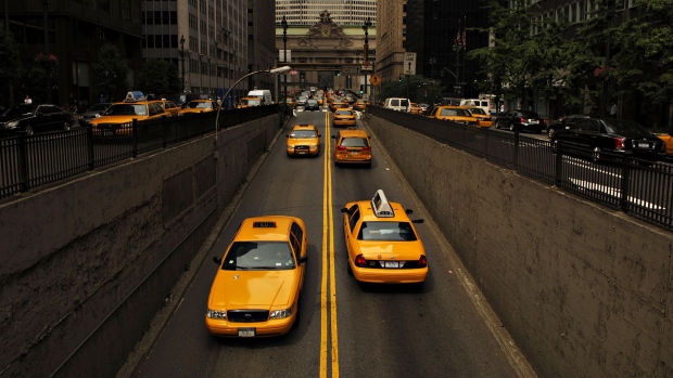 Taxis drive on Park Avenue in New York. 