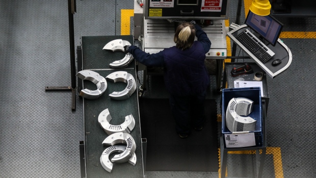 An employee presses metal at Liberty Pressing Solutions in Coventry, U.K., on Monday, April 23, 2018. Aluminum markets are still reeling from U.S. sanctions targeting Putin-allied billionaire Oleg Deripaska and his United Co. Rusal, the top aluminum supplier outside China. 
