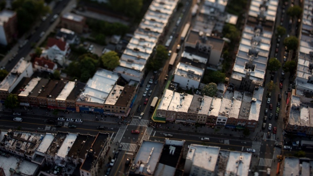 Apartment buildings stand in this aerial photograph taken above the Brooklyn borough of New York, U.S., on Wednesday, June 10, 2015. 