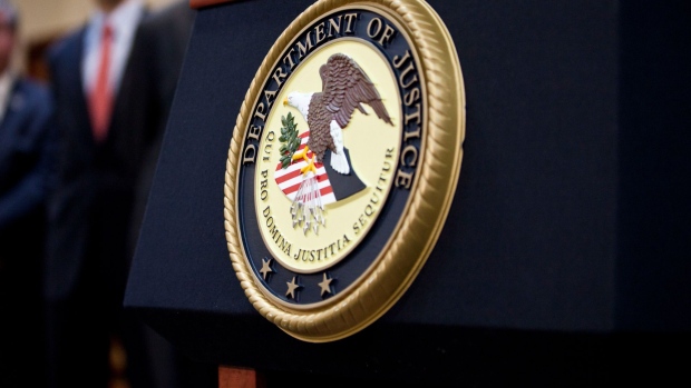 NEW YORK, NY - DECEMBER 11: A US Department of Justice seal is displayed on a podium during a news conference to announce money laundering charges against HSBC on December 11, 2012 in the Brooklyn borough of New York City. HSBC Holdings plc and HSBC USA NA have agreed to pay $1.92 billion and enter into a deferred prosecution agreement with the U.S. Department of Justice in regards to charges involving money laundering with Mexican drug cartels. (Photo by Ramin Talaie/Getty Images) 