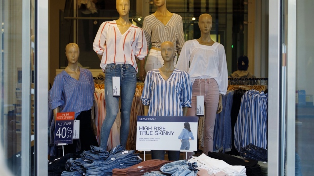 Clothing is displayed for sale inside a Gap Inc. store on the Third Street Promenade in Santa Monica, California. 