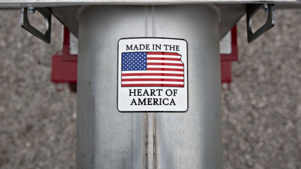 A "Made In The Heart Of America" sticker is displayed on grain loading equipment on display during the Farm Progress Show in Boone, Iowa, U.S., on Tuesday, Aug. 28, 2018. The show, sponsored by Farm Progress Co. and owned by Penton Media, is billed as the largest outdoor farm show in the U.S. 