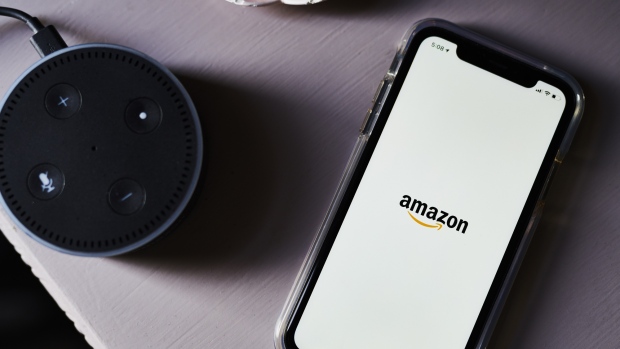 The Amazon.com Inc. logo is displayed on an Apple Inc. iPhone in this arranged photograph taken in the Brooklyn borough of New York, U.S., on Monday, April 22, 2019. Amazon.com Inc. is scheduled to release earnings figures on April 25. 