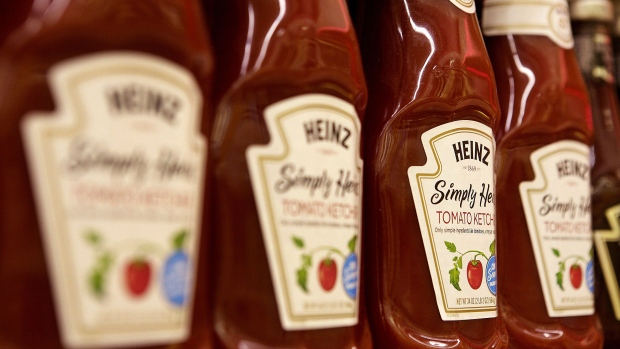 Bottles of H.J. Heinz Co. ketchup products are displayed on a shelf for sale at grocery store in Pittsburgh, Pennsylvania, U.S., on Thursday, Feb. 14, 2013. 