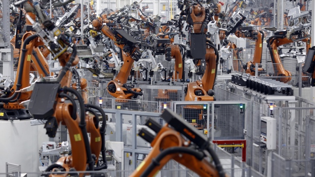 Robots weld car body components for vehicles at the Bayerische Motoren Werke AG (BMW) Manufacturing Co. assembly plant in Greer, South Carolina, U.S. on Thursday, May 10, 2018. Markit is scheduled to release manufacturing figures on May 23. 